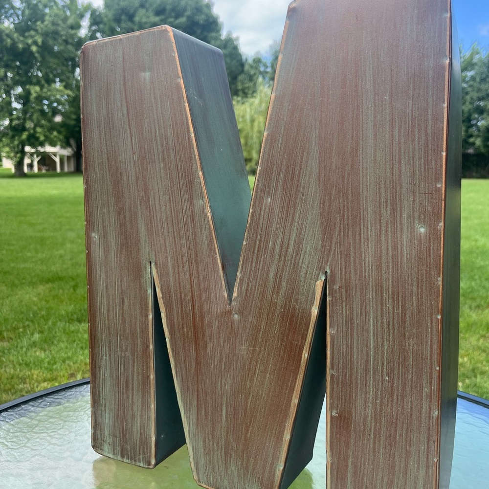 Rustic Brown and Green Metal Letter 'M'. 16” tall. Hang on a wall or stand alone